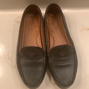 Black leather Coach loafers